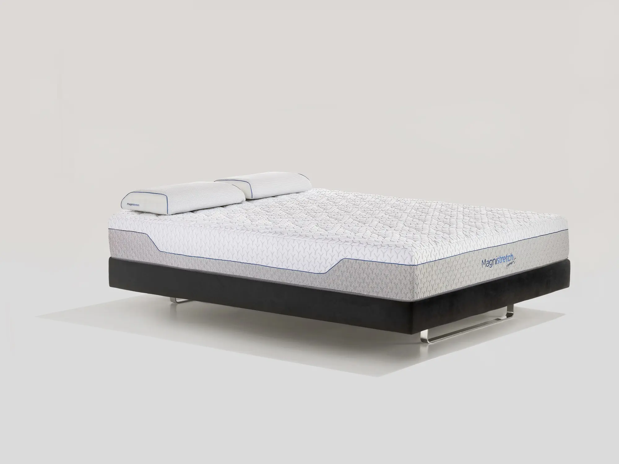 Materasso MagniStretch Sport 9, vista laterale con guanciali